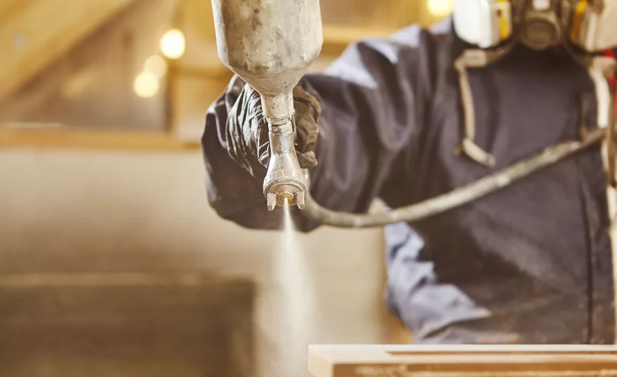 shutterstock_900.jpg paint sprayer in a workshop